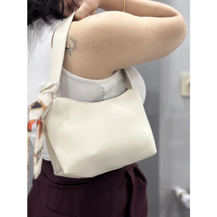 Riwan krem cilt çanta