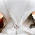 Pembe Zirkon Taşlı Kanatlı Çelik Kolye