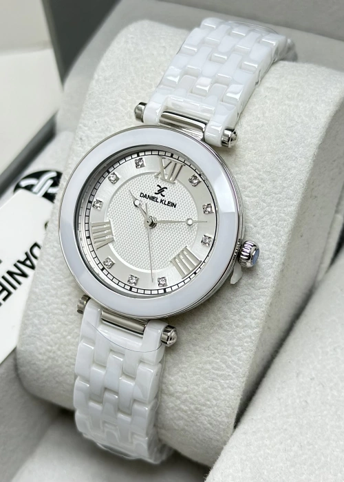Daniel Klein Orijinal 2 Yıl Garantili Su Geçirmez Beyaz Seramik Kordon Gümüş Kasa Kadın Kol Saati ILK14282K2