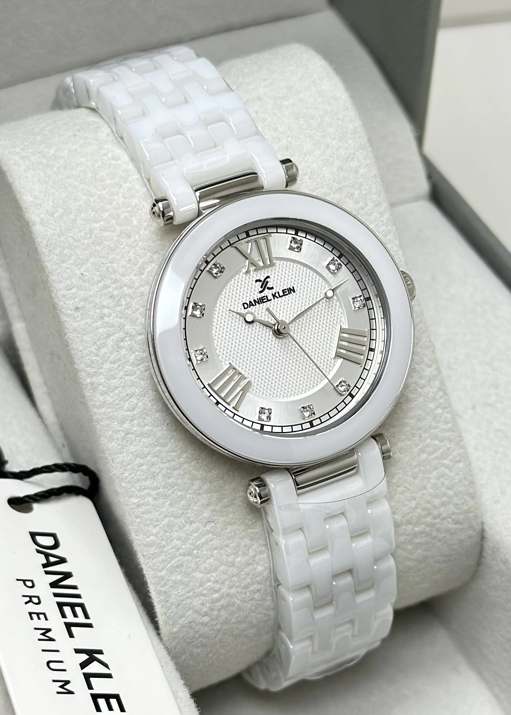 Daniel Klein Orijinal 2 Yıl Garantili Su Geçirmez Beyaz Seramik Kordon Gümüş Kasa Kadın Kol Saati ILK14282K2