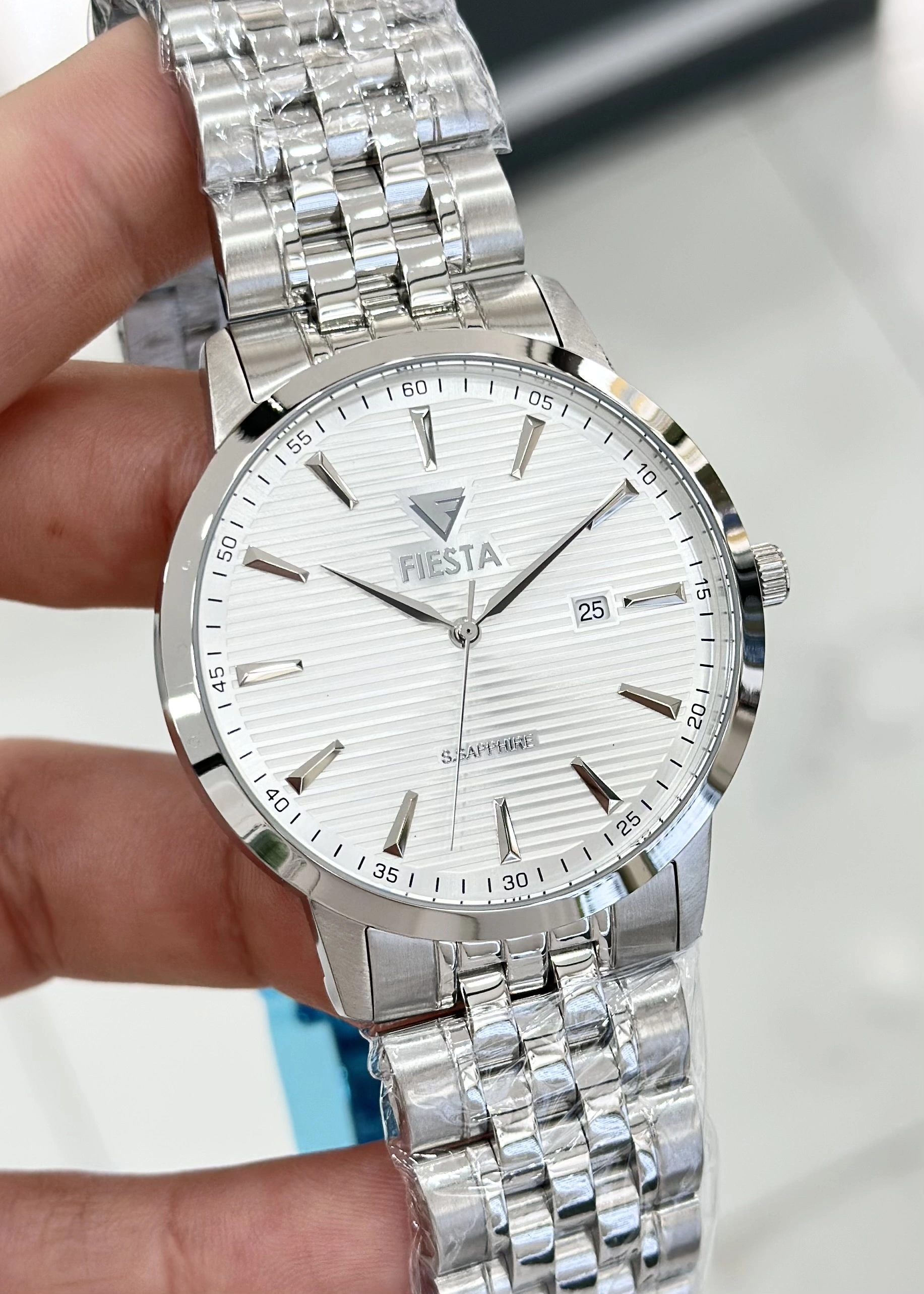 HEDİYELİK FİESTA ÇELİK KORDON SU GEÇİRMEZ RENK ATMAZ BEYAZ KADRAN ORJİNAL 2 YIL GARANTİLİ ERKEK KOL SAATİ