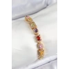 Pirinç Karışık Zirkon Taşlı Baget Model Gold Renk VIP Seri Kadın Bileklik