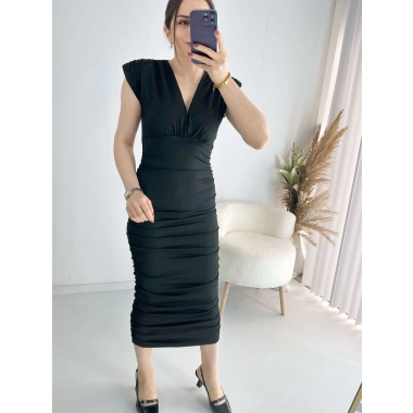 Derin Dekolteli Yan Büzgülü Örme Elbise