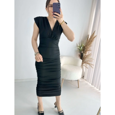 Derin Dekolteli Yan Büzgülü Örme Elbise
